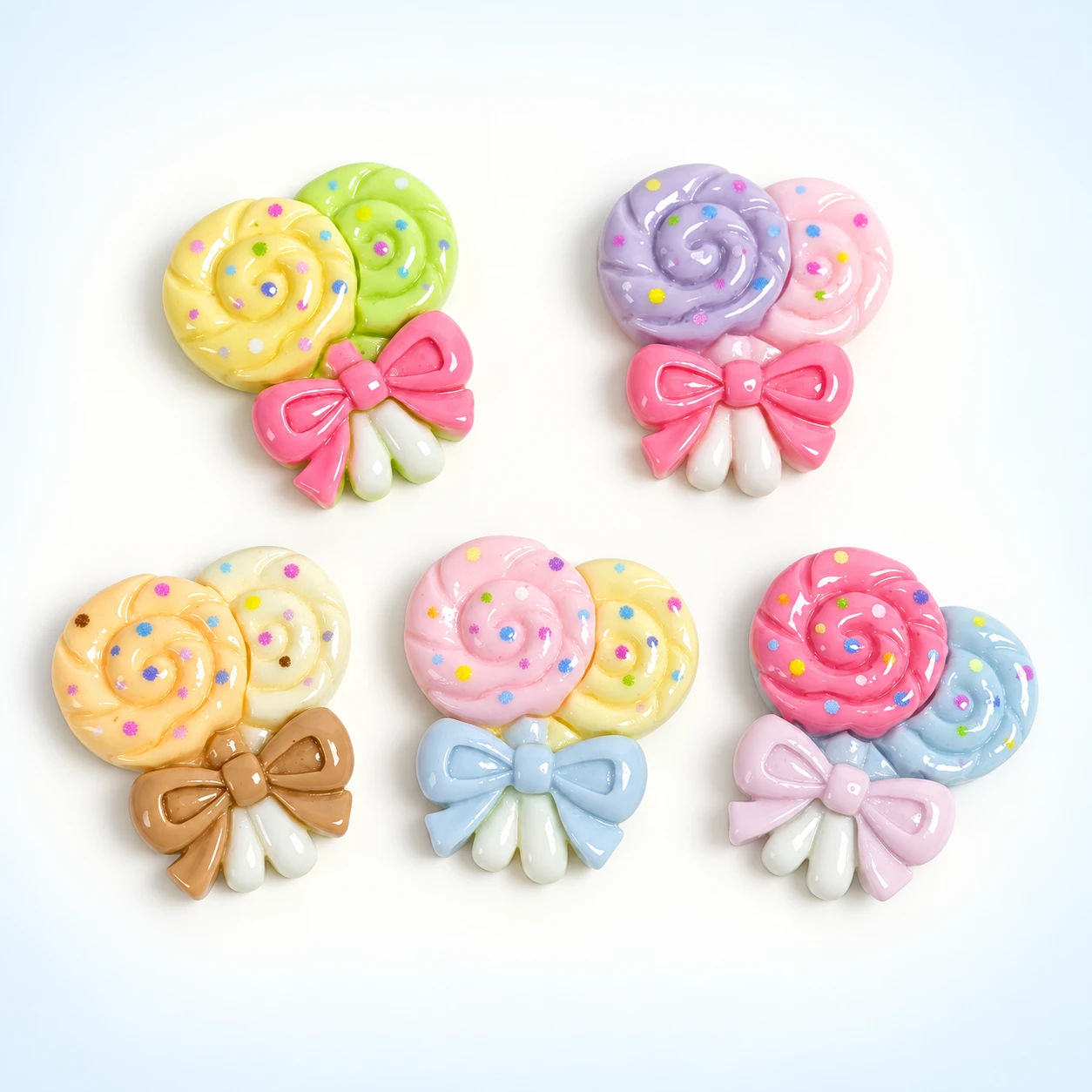 Bow Lollipop Resin Charms RW003564 on a clean light studio background
