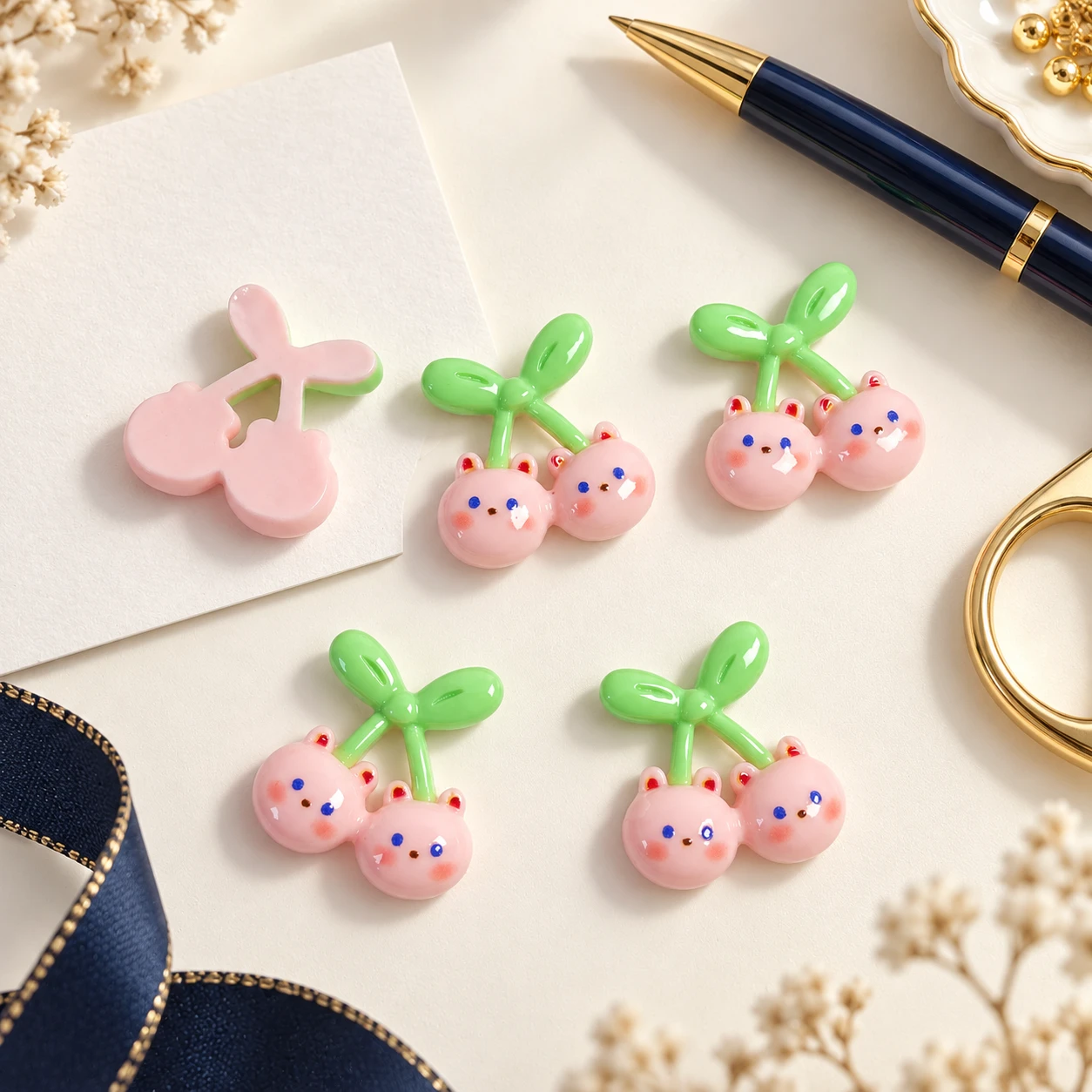 Cherry Bear Resin Charms RW002852 in an illustrative craft workspace