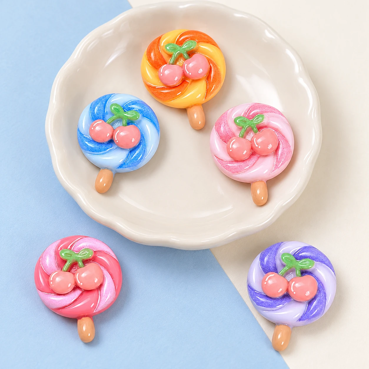 Cherry Swirl Lollipop Resin Charms RW003313 displayed for assortment selection