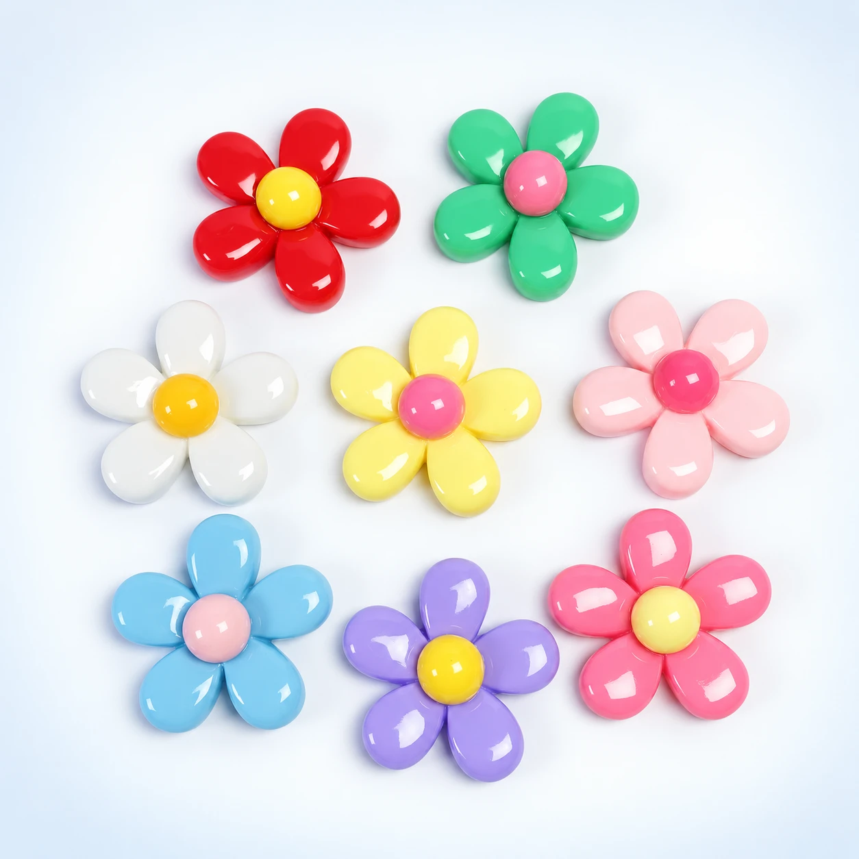 Colorful Five-Petal Flower Resin Charms RW002225 / RW26715 on a clean light studio background
