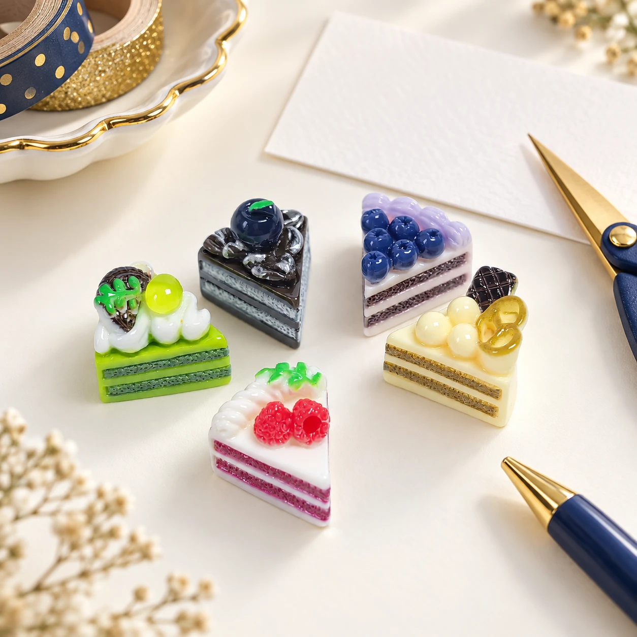 Fruit Layer Cake Resin Charms RW002658 in an illustrative craft workspace
