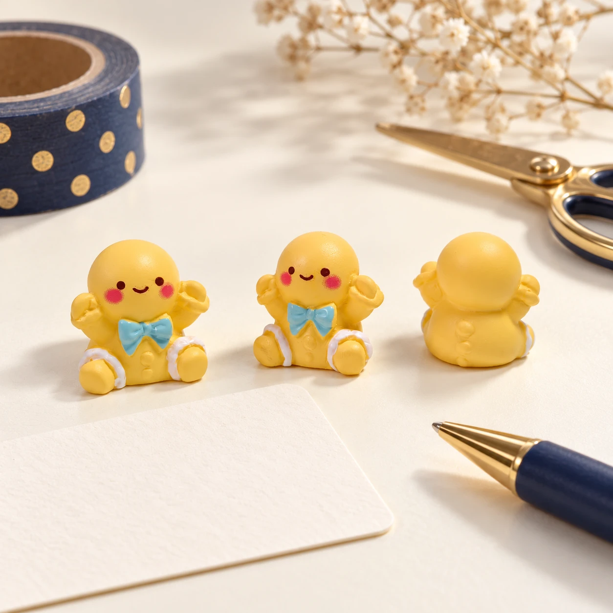 Gingerbread Figure Resin Charms RW001884 in an illustrative craft workspace