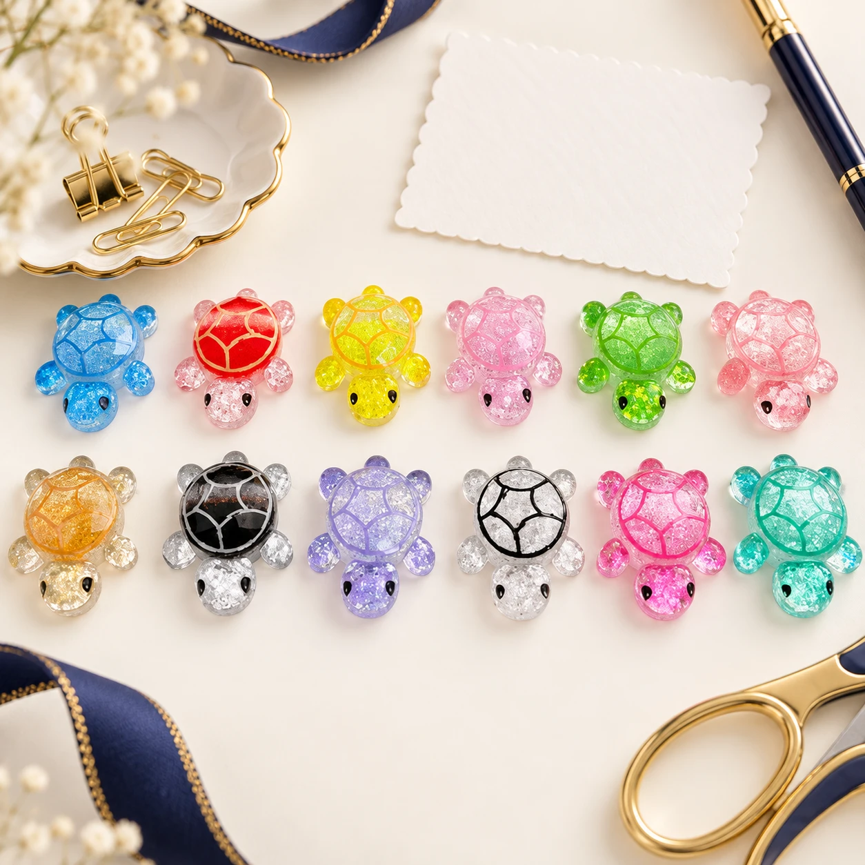 Glitter Shell Turtle Resin Charms RW26057-2 in an illustrative craft workspace
