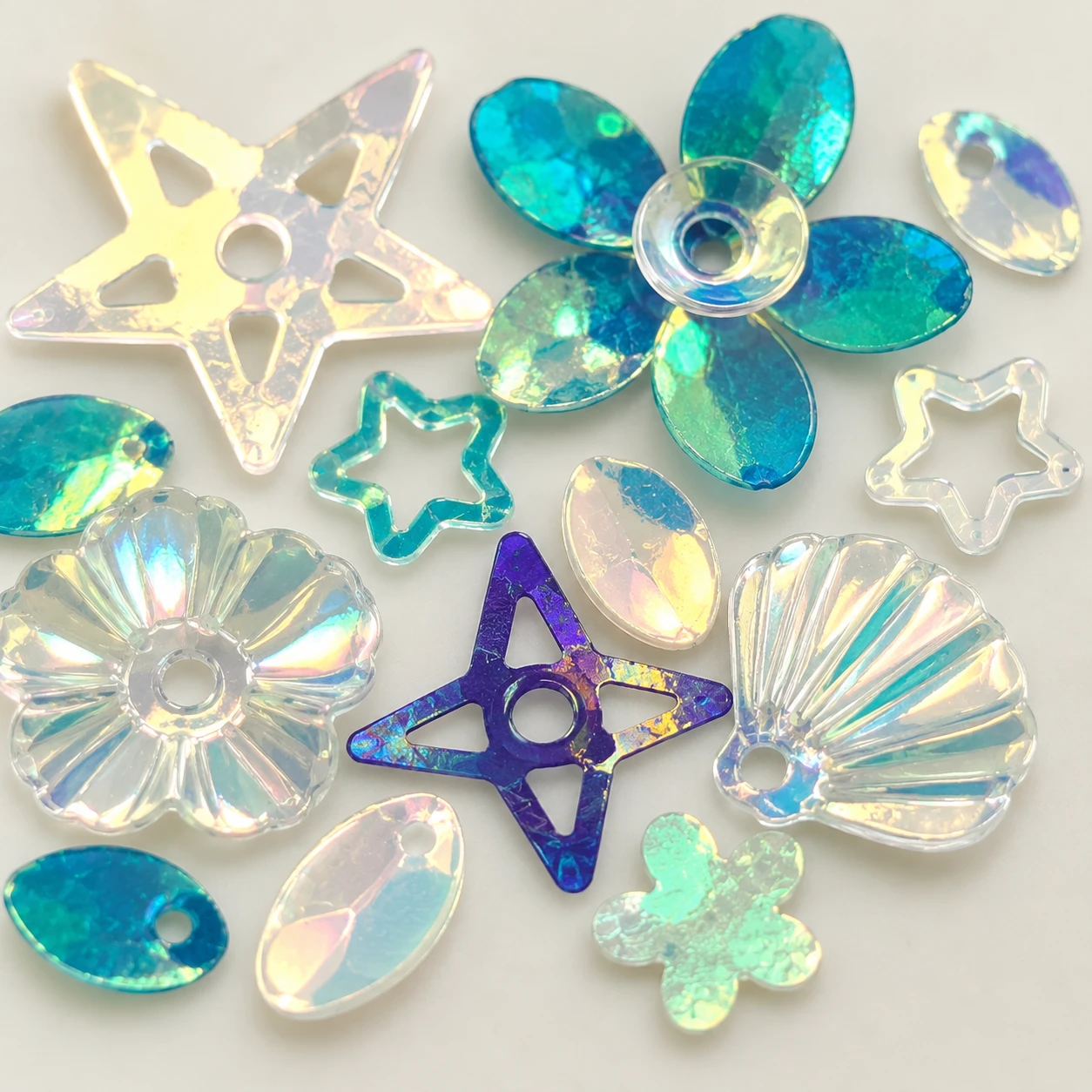 Gold Teal Iridescent Glitter Mix MA172 close-up showing the decorative shape and finish