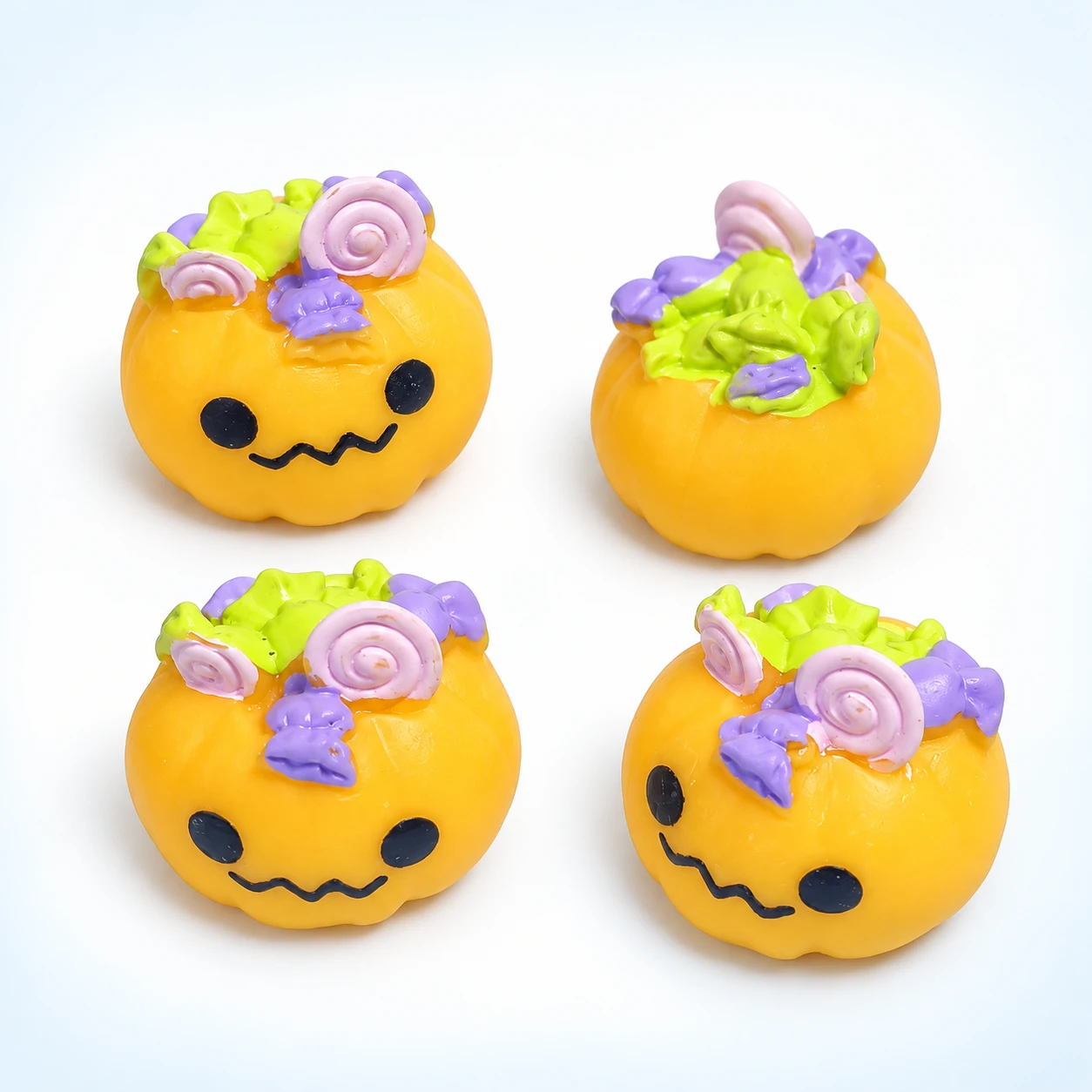 Halloween Candy Pumpkin Resin Charms RW001917 on a clean light studio background
