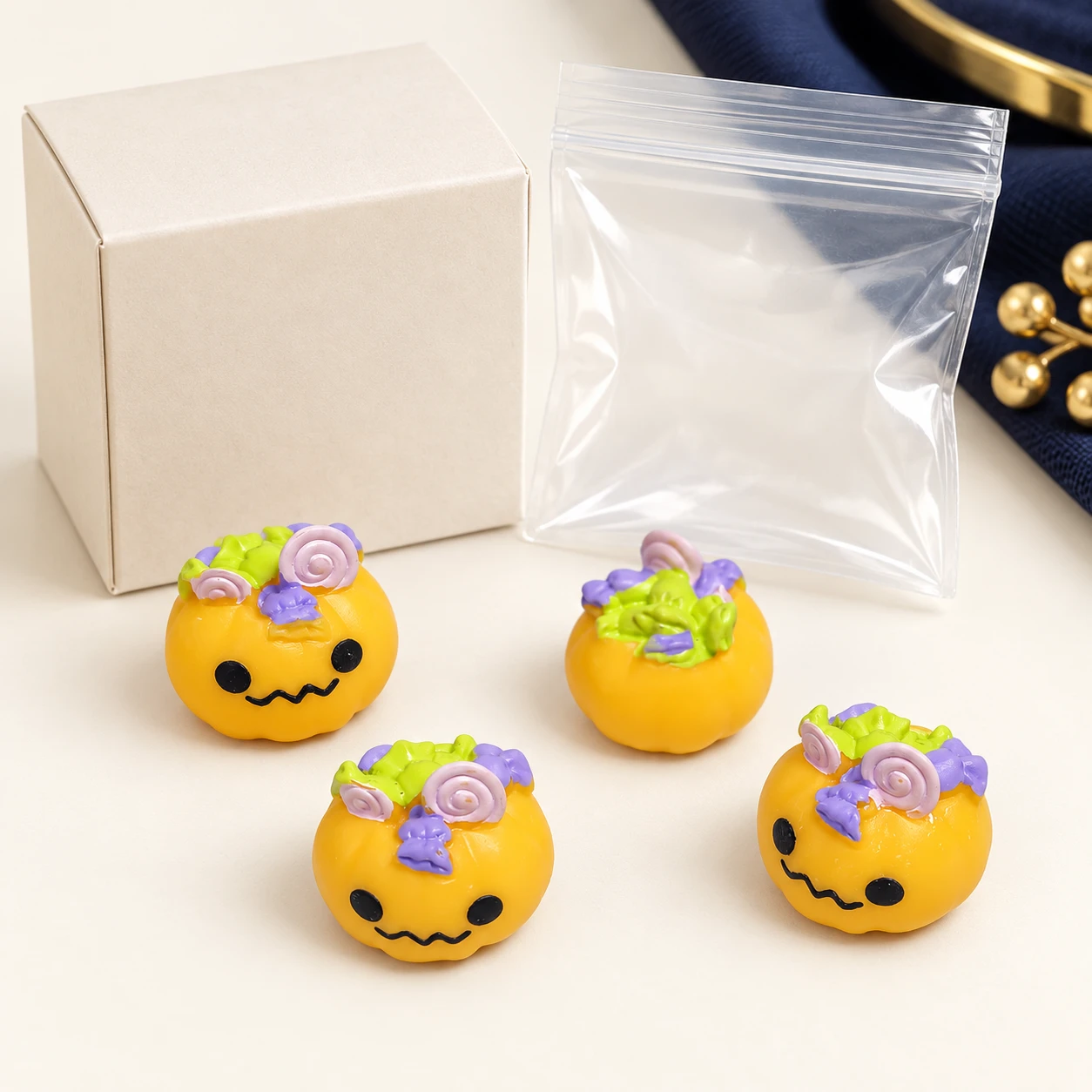 Halloween Candy Pumpkin Resin Charms RW001917 with illustrative private-label packaging