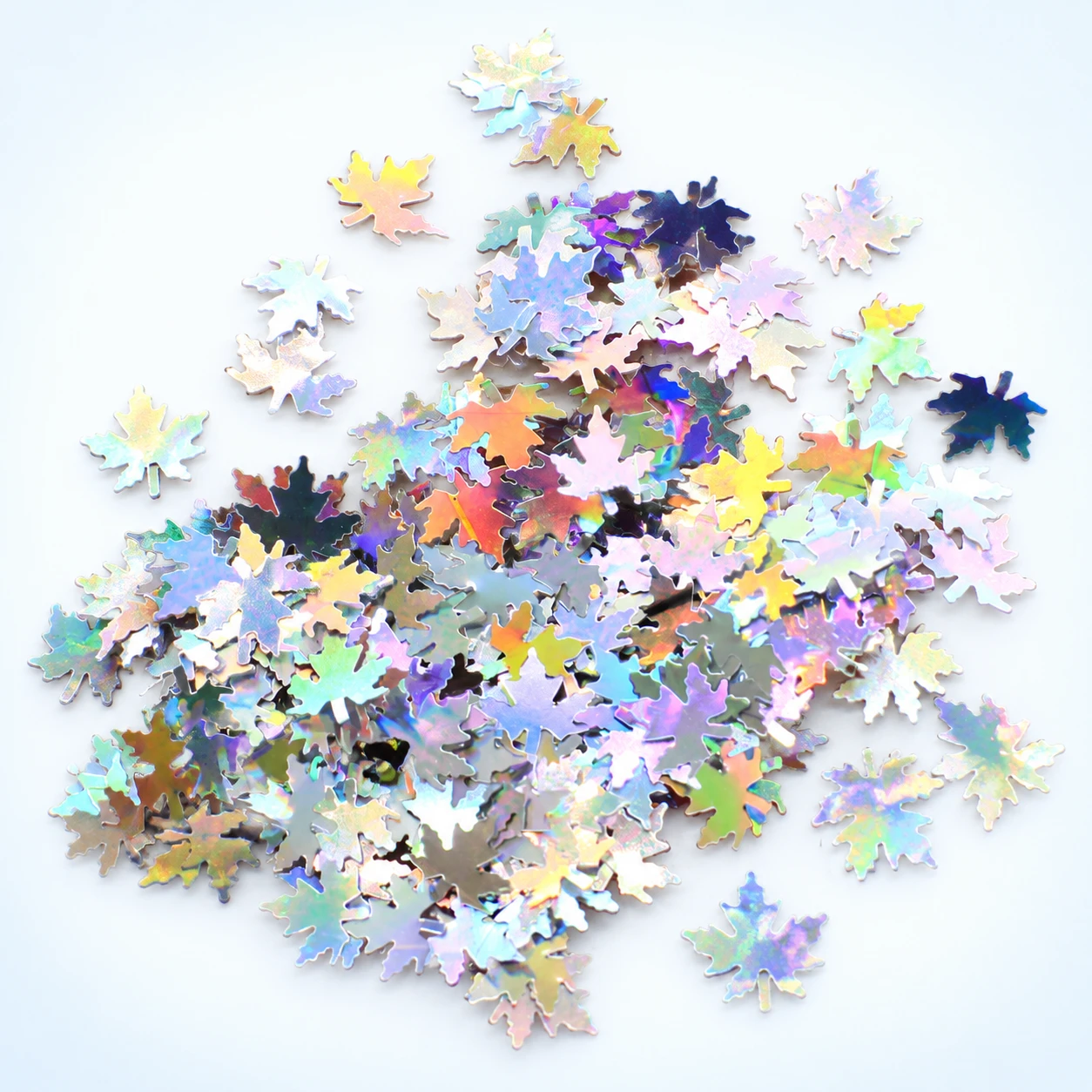 Holographic Maple Leaf Sequins MA129 on a clean light studio background