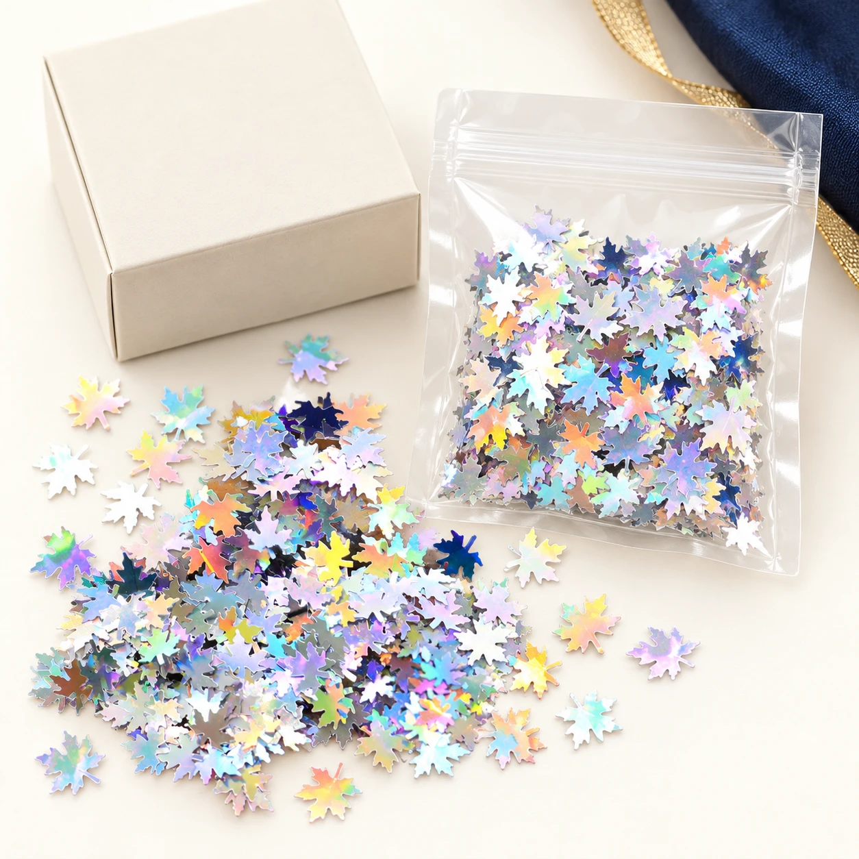 Holographic Maple Leaf Sequins MA129 with illustrative private-label packaging