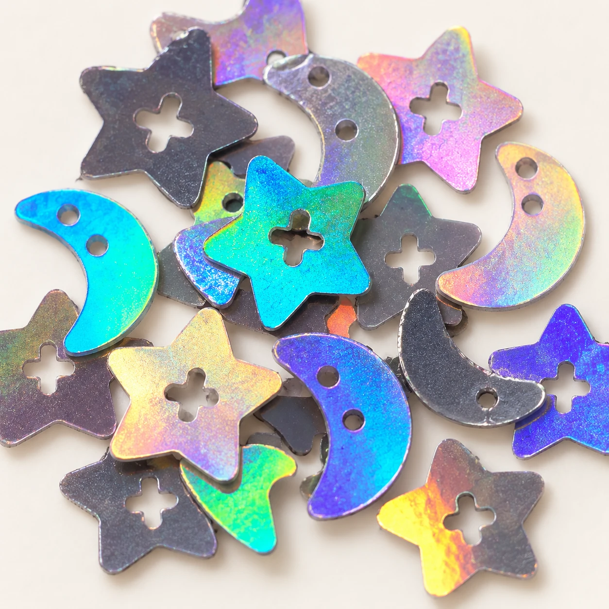Holographic Star and Moon Sequin Mix MA293 close-up showing the decorative shape and finish