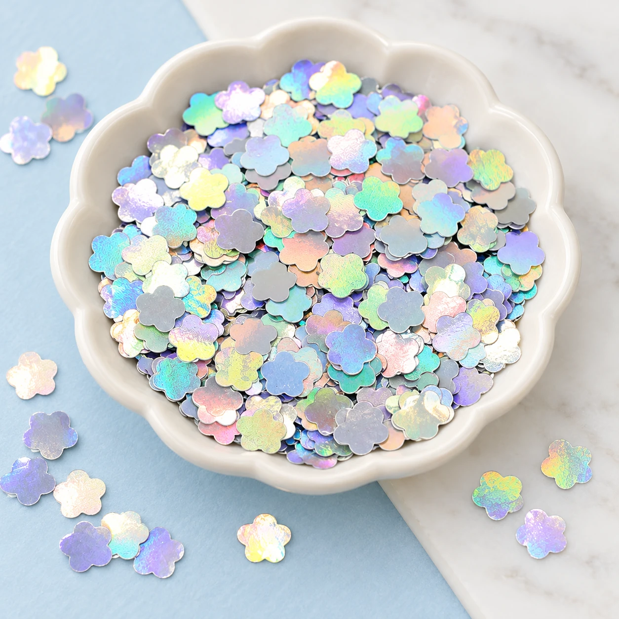 Iridescent Five-Petal Flower Sequins MA070 displayed for assortment selection
