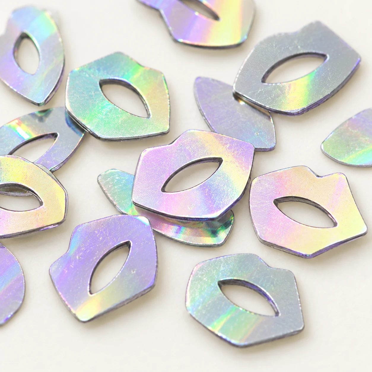 Iridescent Hollow Lip Sequins MA102 close-up showing the decorative shape and finish
