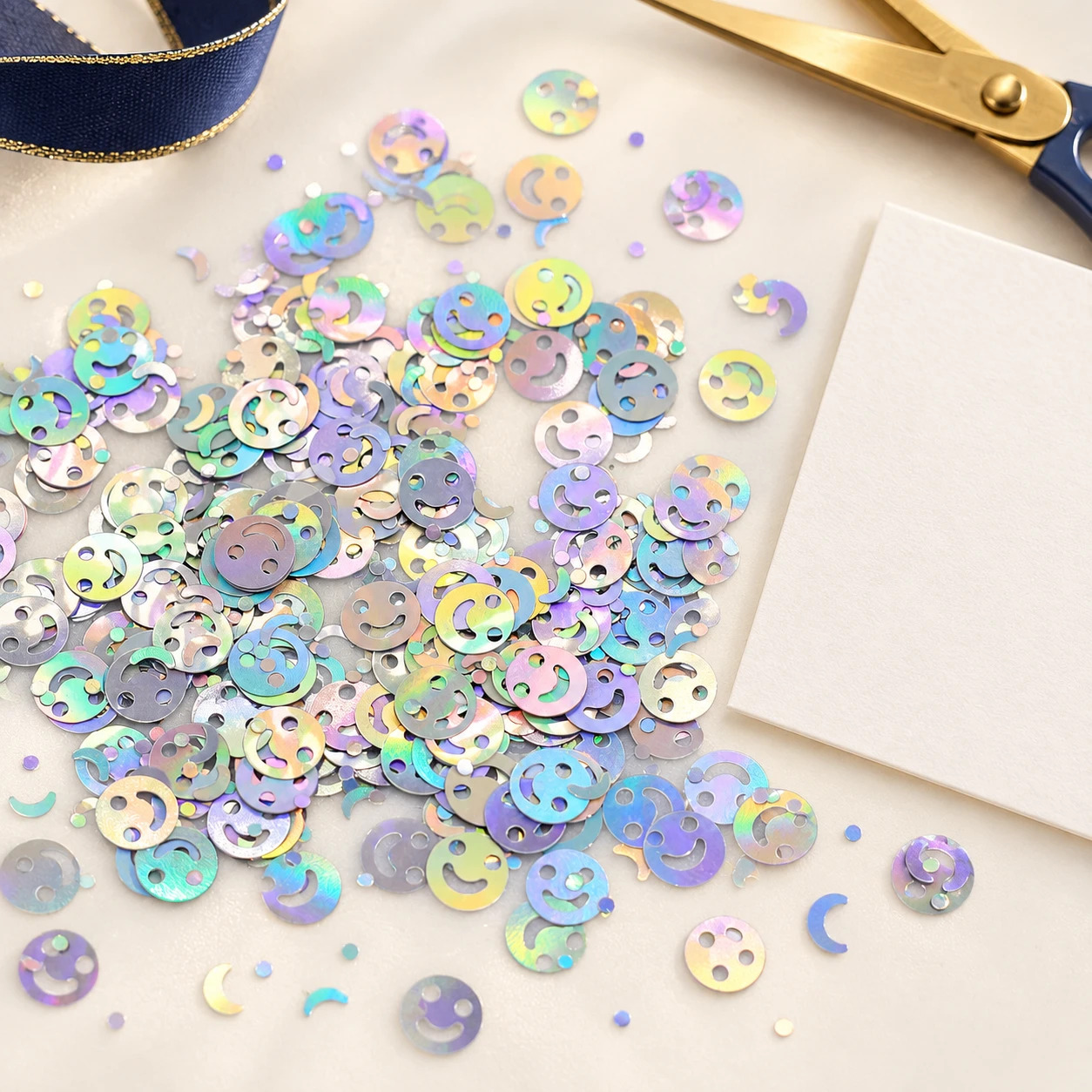 Iridescent Smiley Face Sequins MA069 in an illustrative craft workspace
