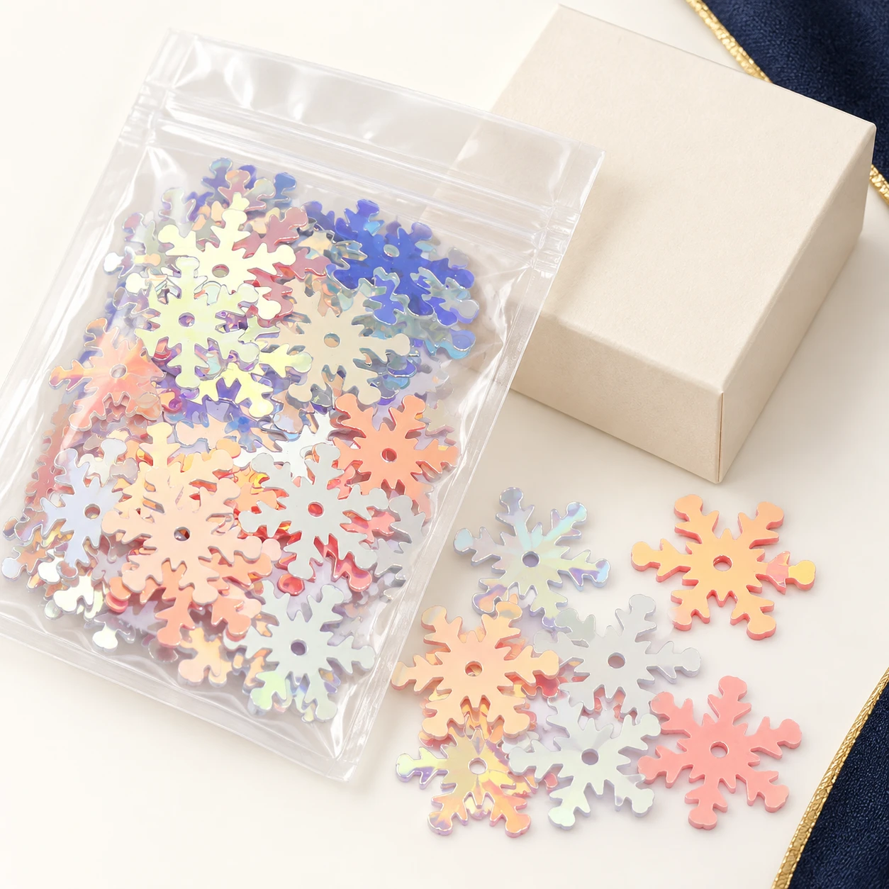 Large Iridescent Snowflake Sequins MA100 with illustrative private-label packaging
