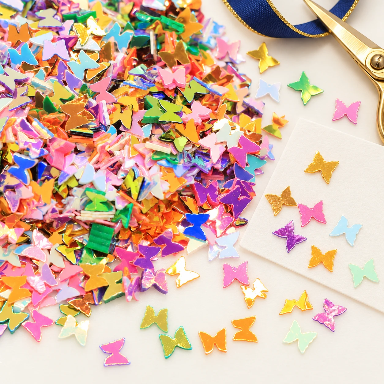 Metallic Bow Tie Sequins MA061 in an illustrative craft workspace