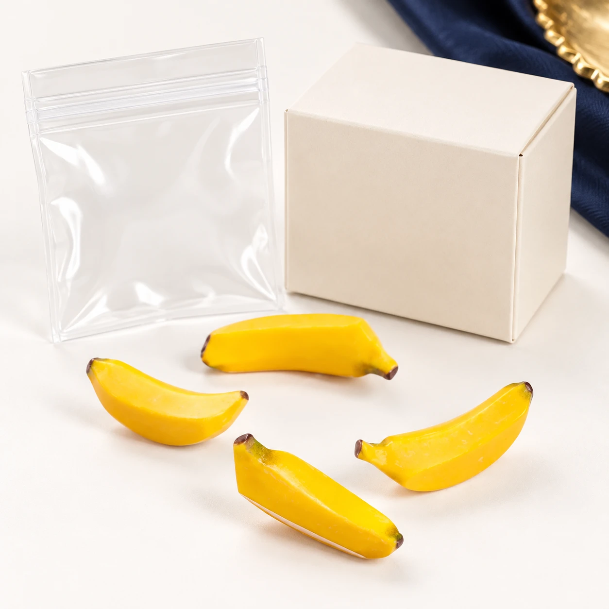 Mini Banana Resin Charms RW003268 with illustrative private-label packaging