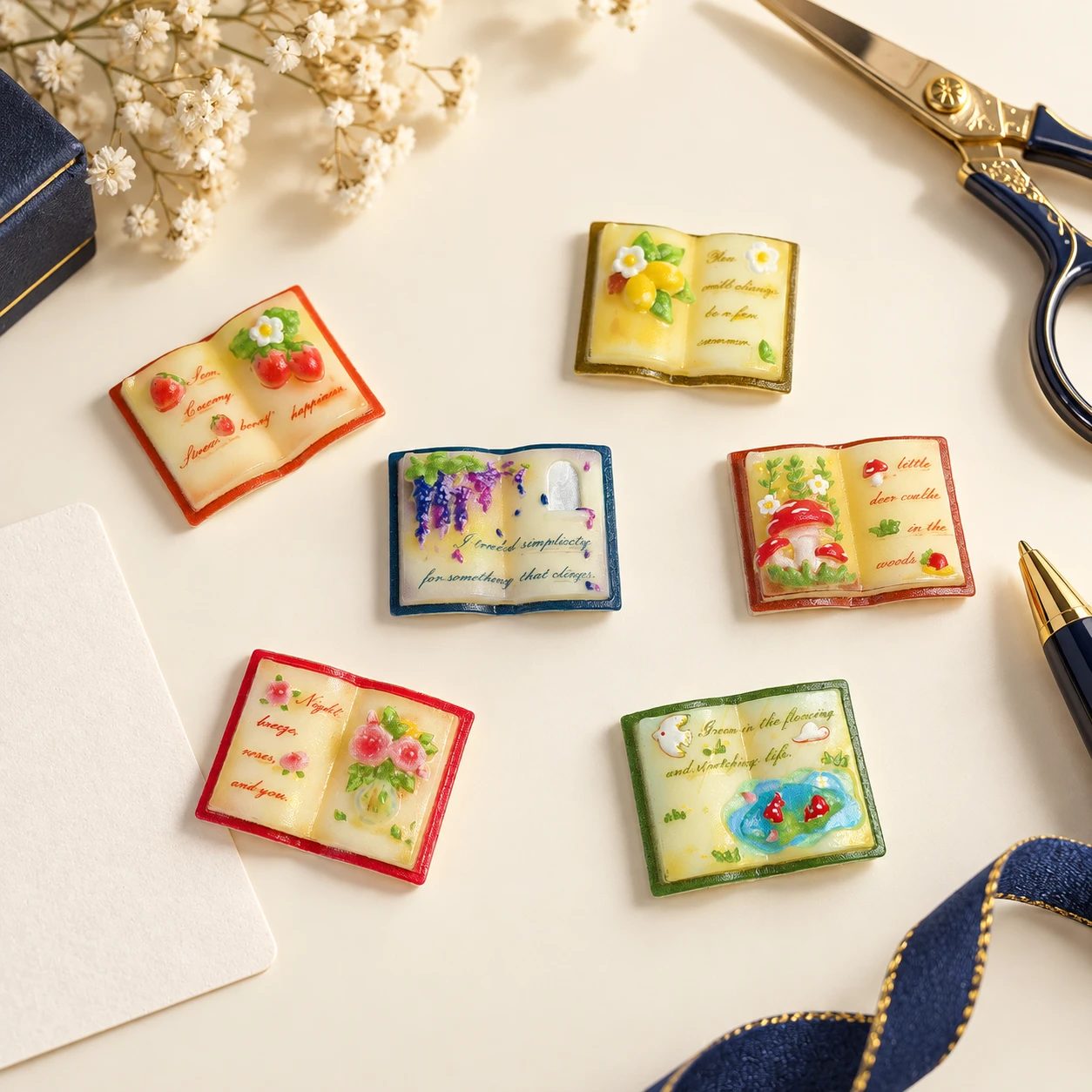 Mini Floral Book Resin Charms RW003270 in an illustrative craft workspace