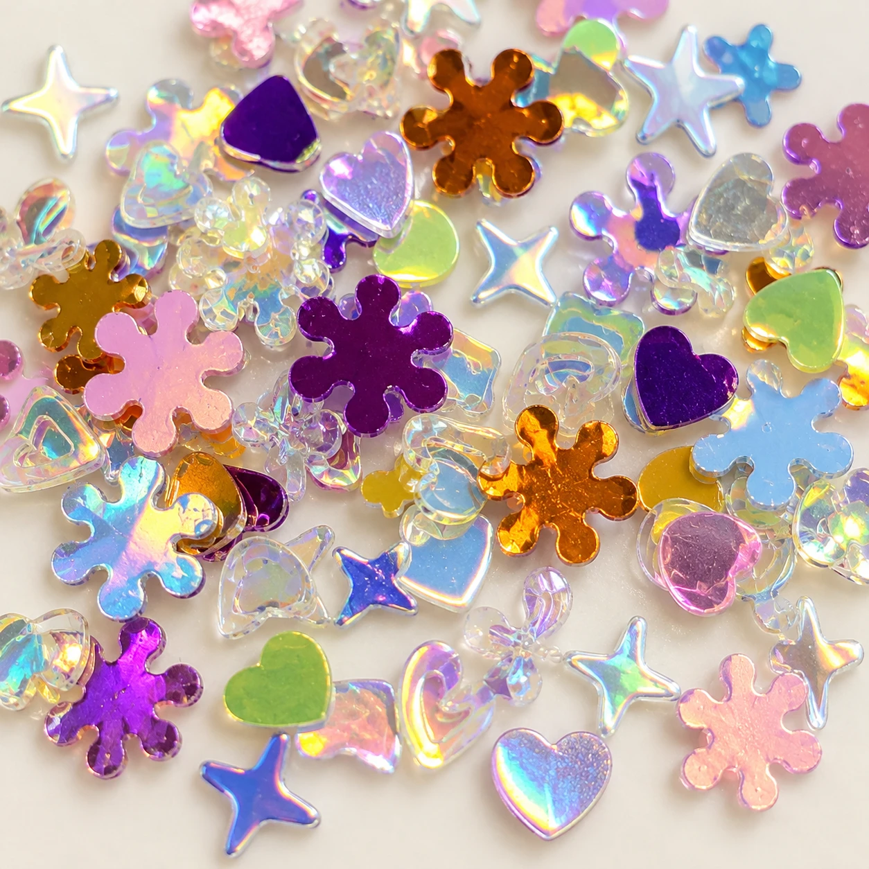 Mini Flower and Star Sequin Mix MA093 close-up showing the decorative shape and finish