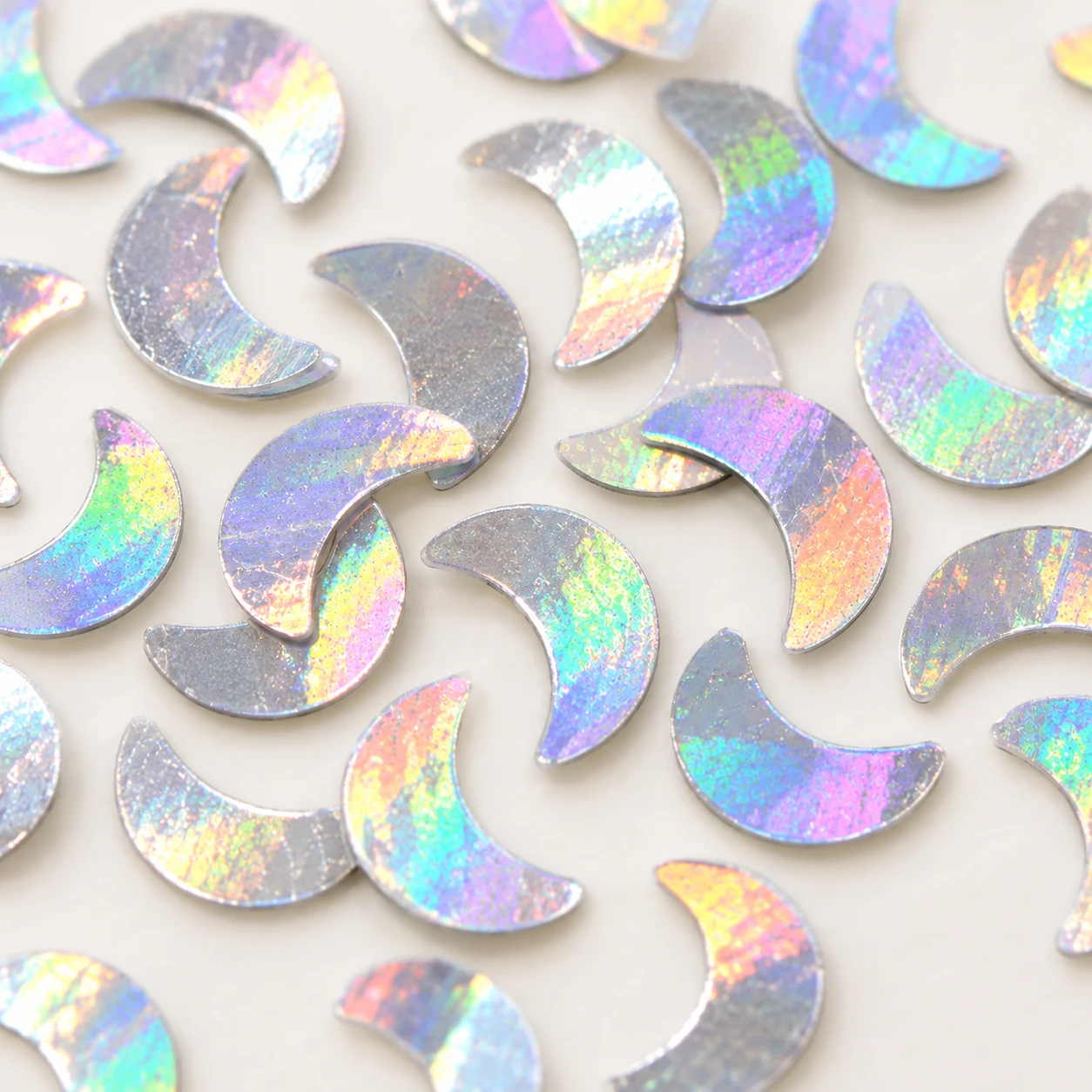 Mini Iridescent Crescent Sequins MA112 close-up showing the decorative shape and finish