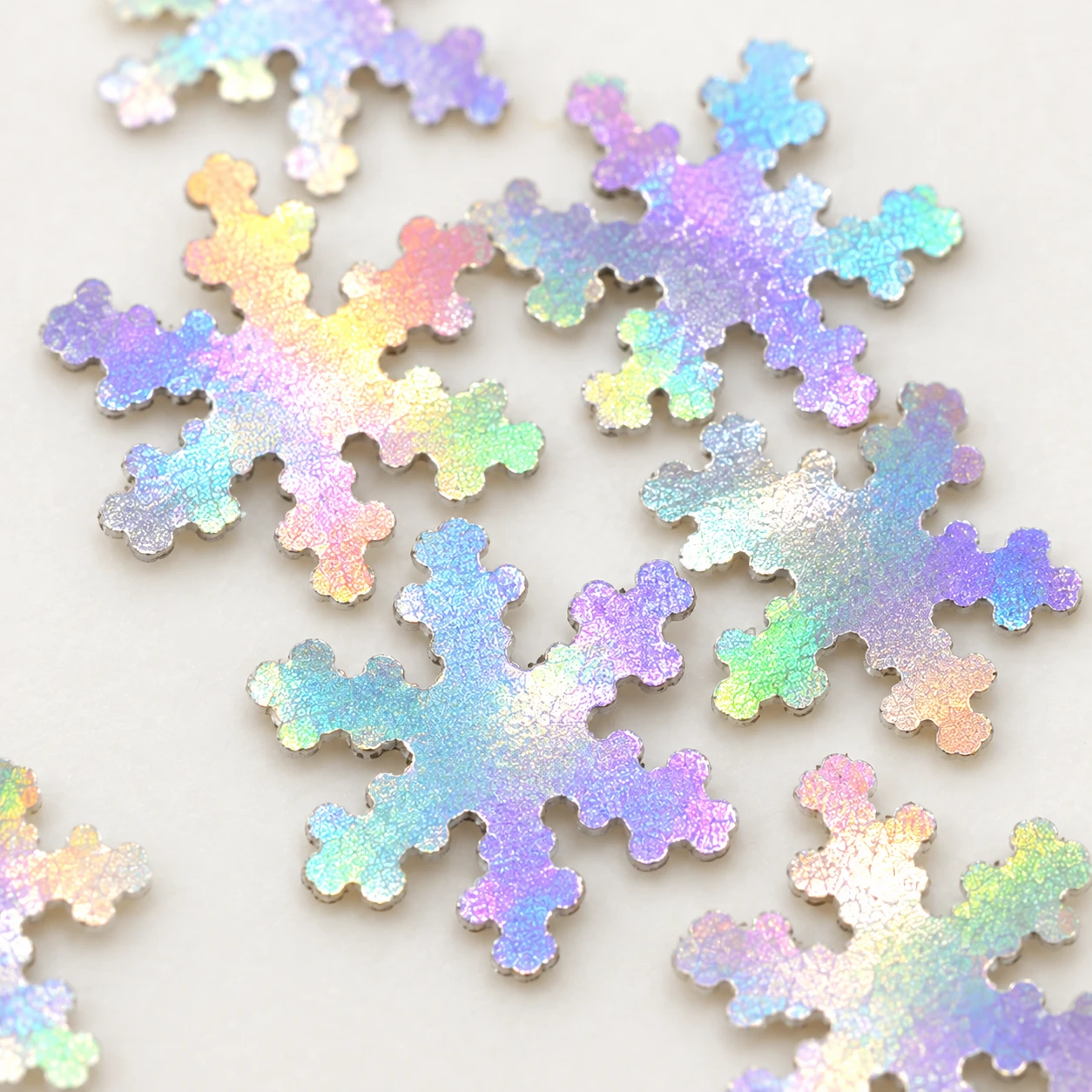 Mini Iridescent Snowflake Sequins MA073 close-up showing the decorative shape and finish