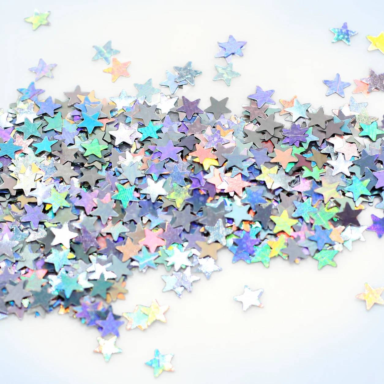 Mini Iridescent Star Sequins MA072 on a clean light studio background
