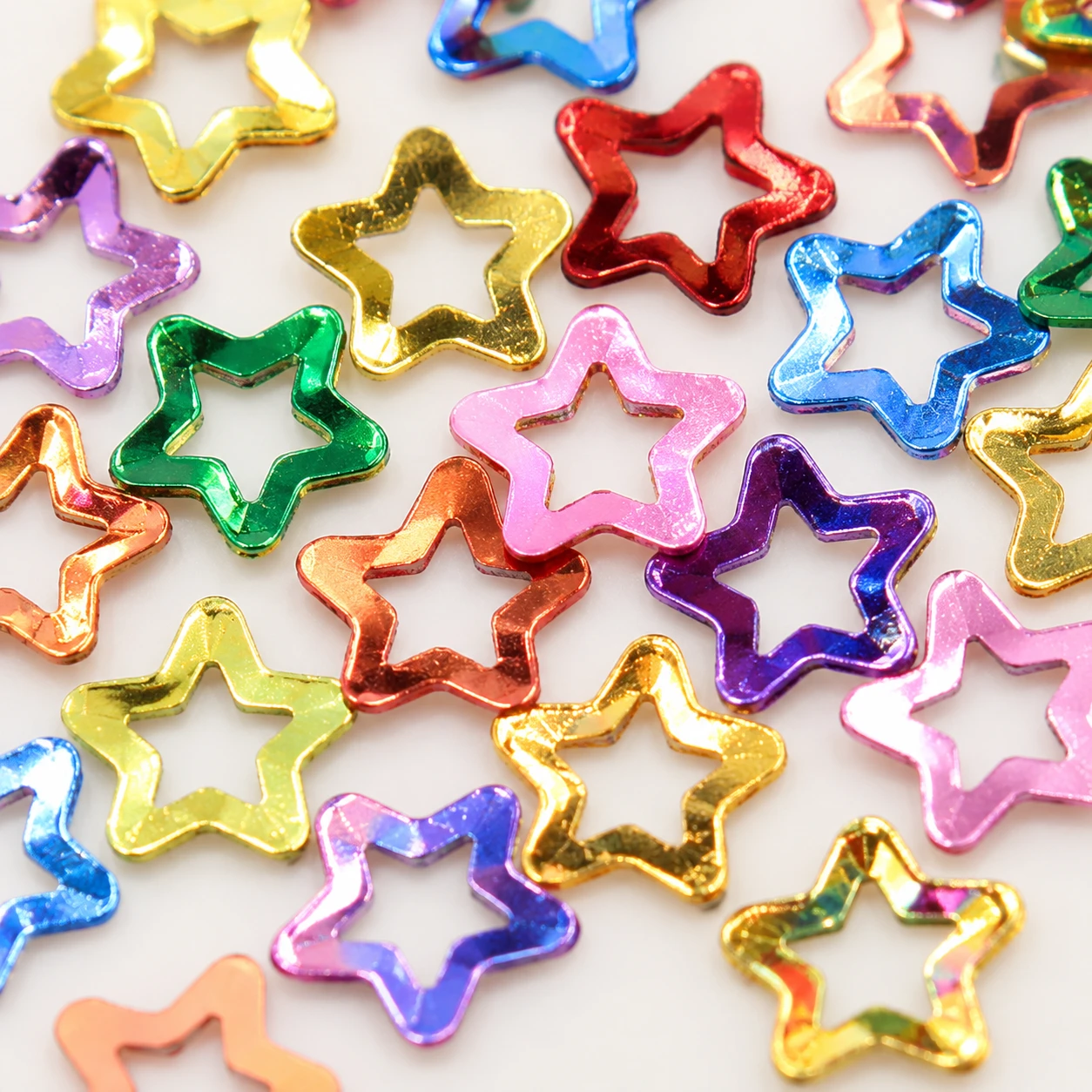 Mini Metallic Hollow Star Sequins MA084 close-up showing the decorative shape and finish