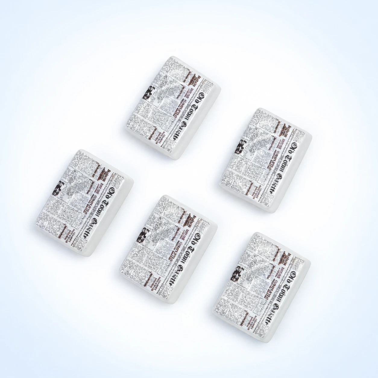 Mini Newspaper Resin Charms RW001857 on a clean light studio background