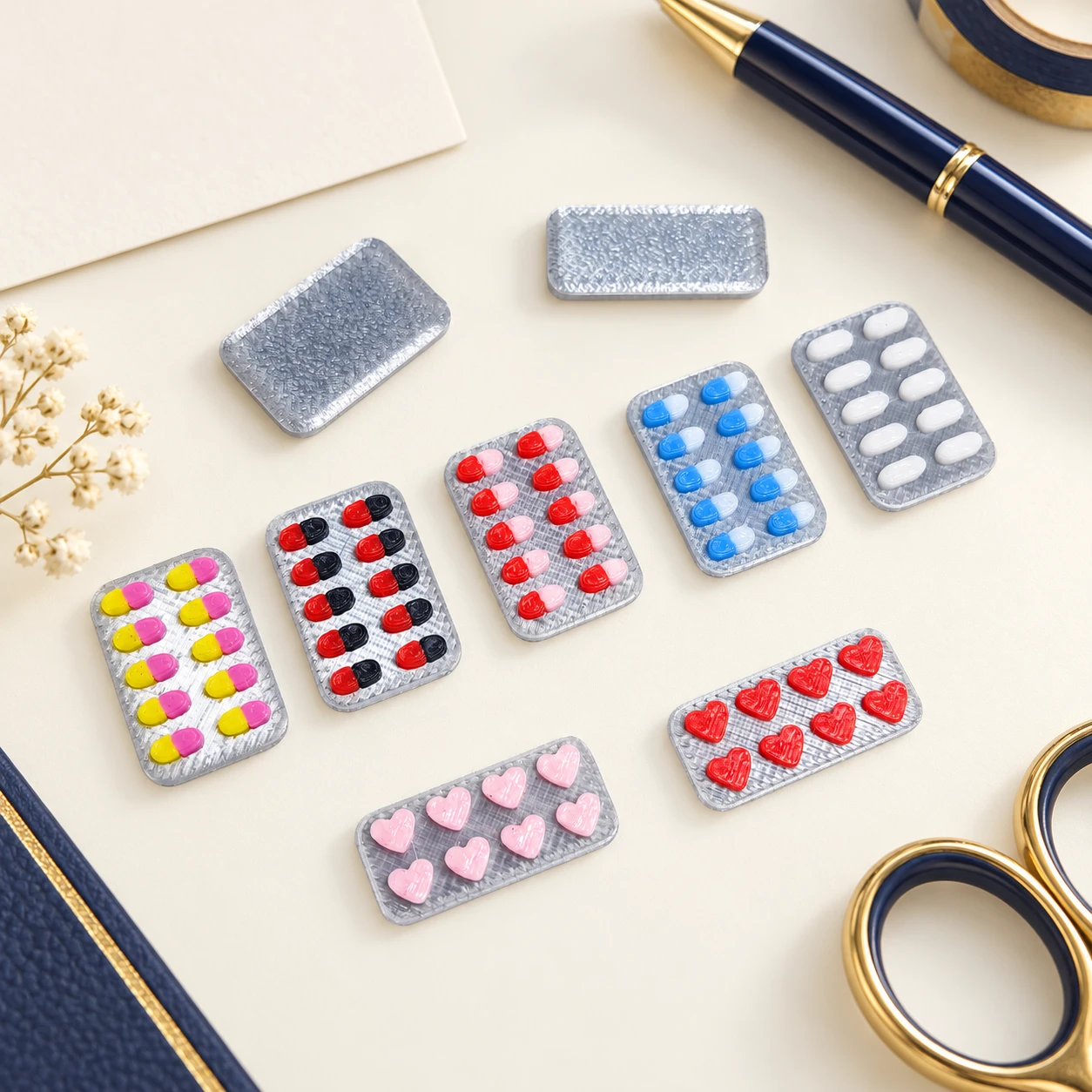 Mini Pill Blister Resin Decorations RW001818 in an illustrative craft workspace
