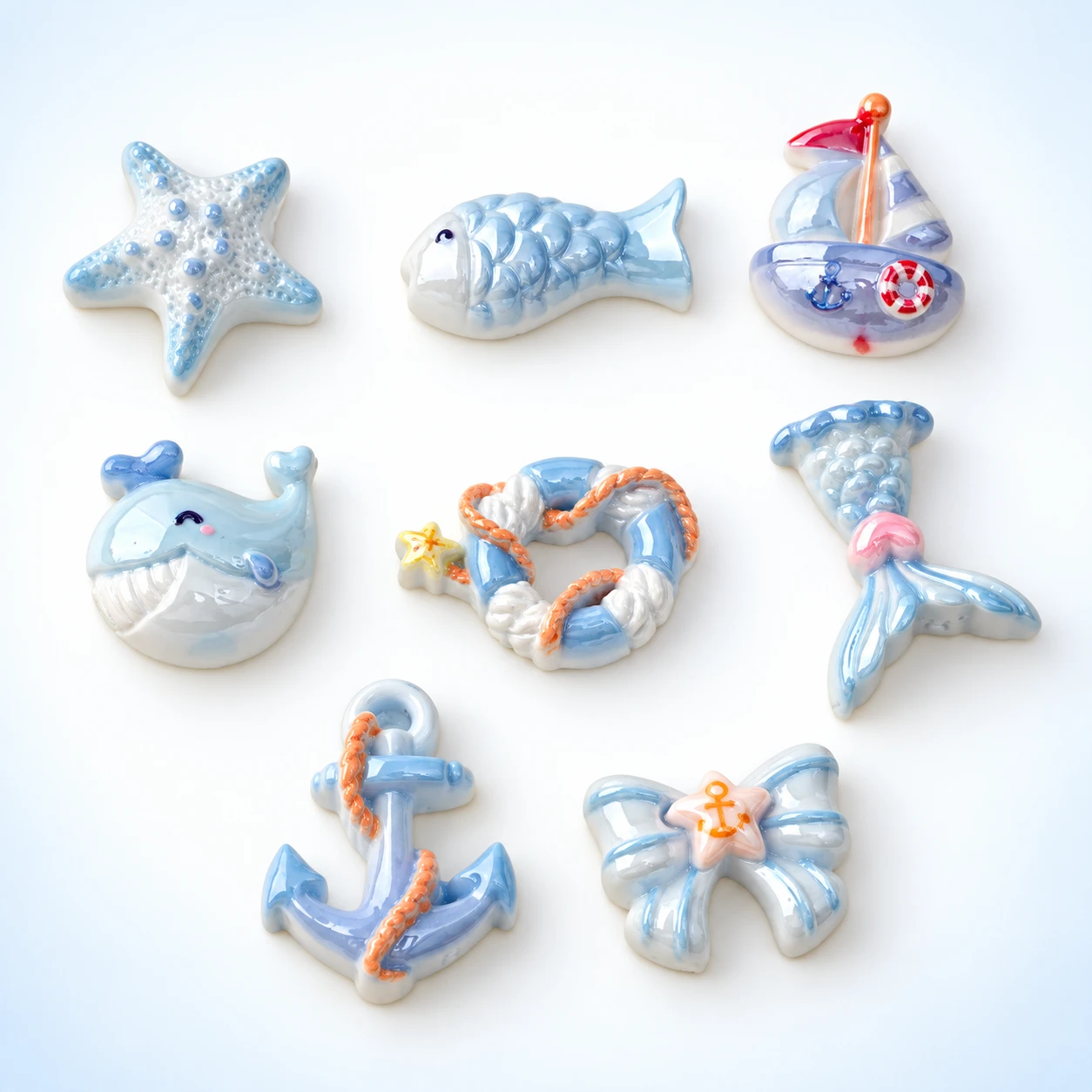 Ocean Mermaid Tail and Whale Resin Charms RW00686 on a clean light studio background