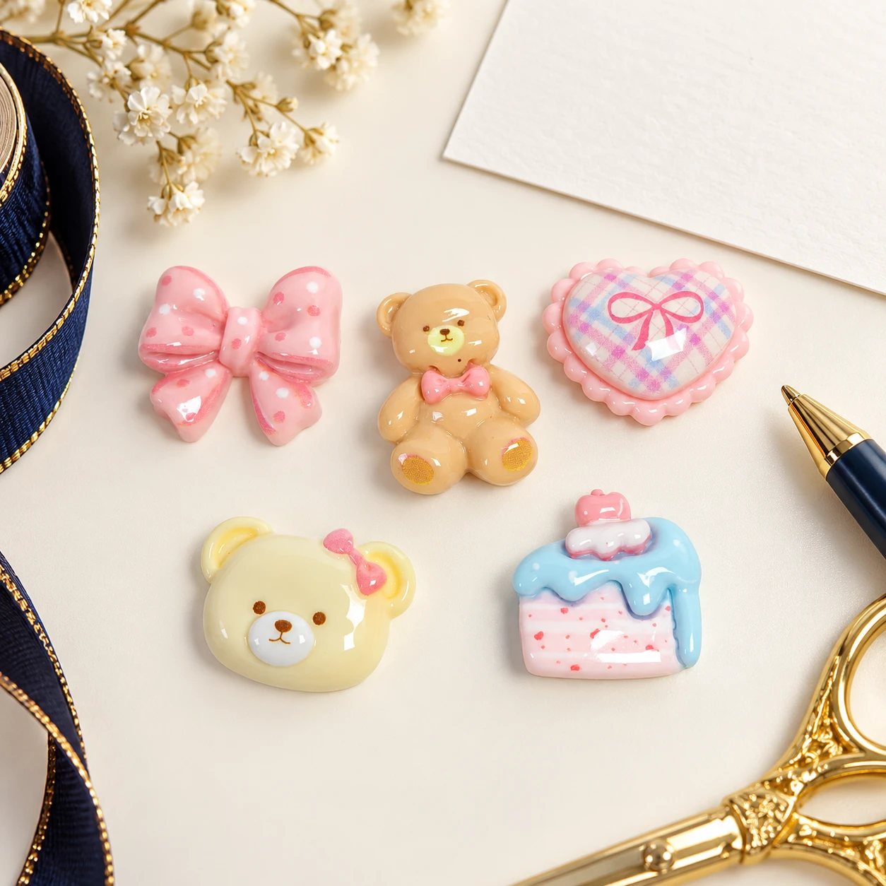 Pastel Bear Bow and Heart Resin Assortment RW002022 in an illustrative craft workspace