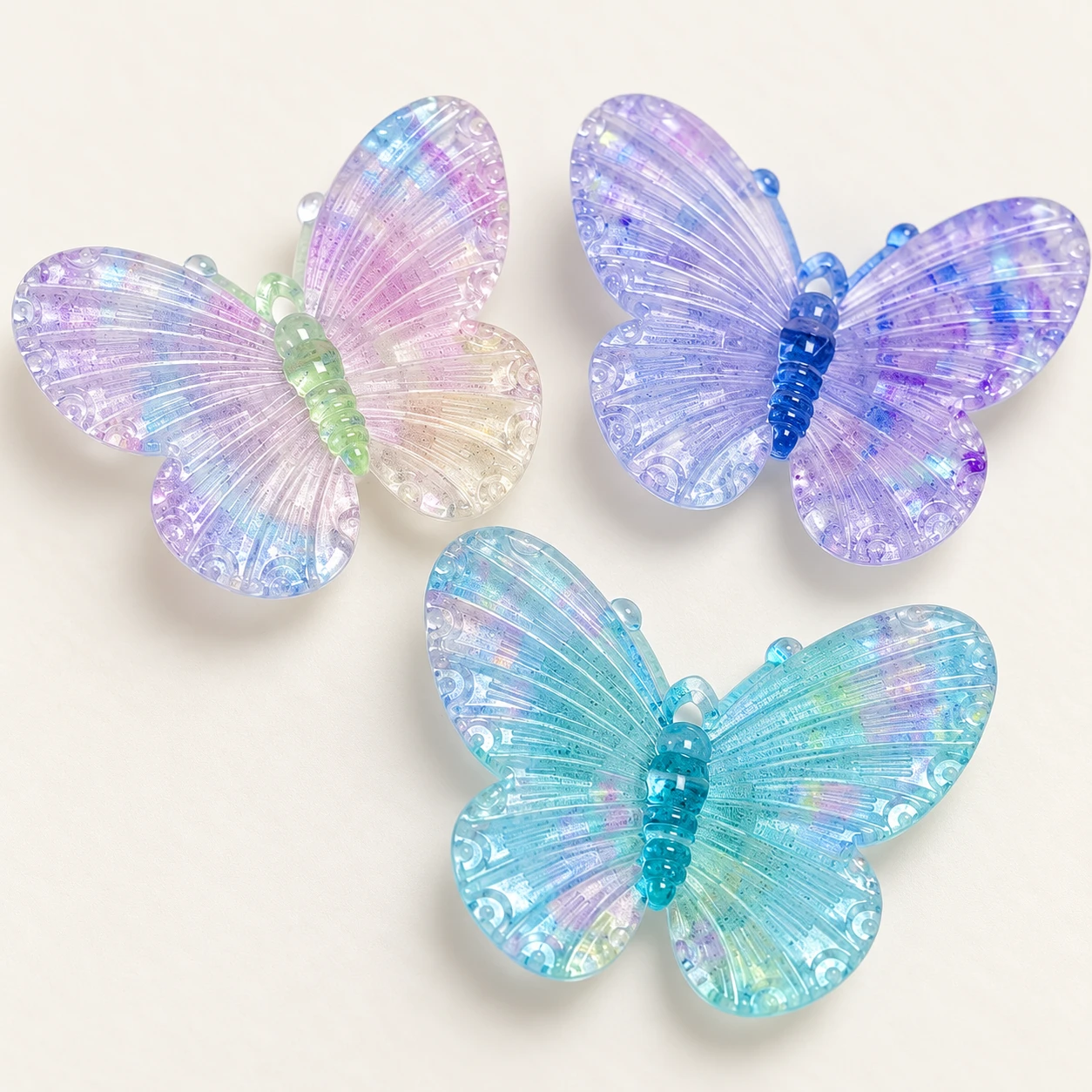 Pastel Iridescent Butterfly Resin Charms RW002654 / RW26619 close-up showing the decorative shape and finish