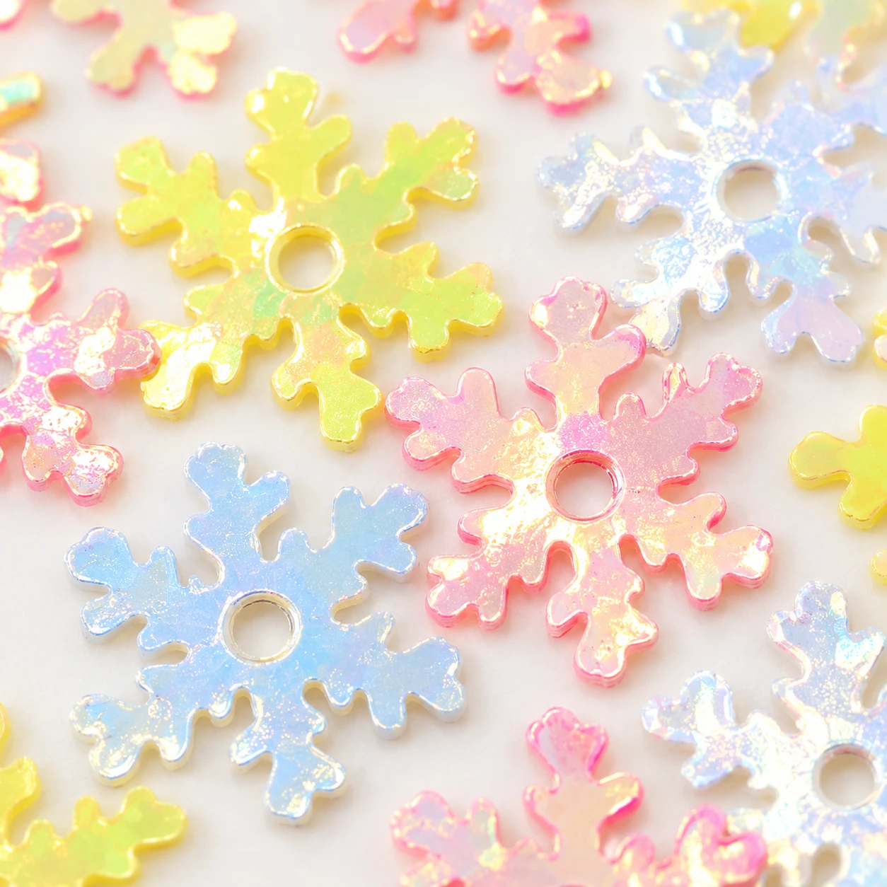 Pastel Snowflake Sequin Mix MA096 close-up showing the decorative shape and finish