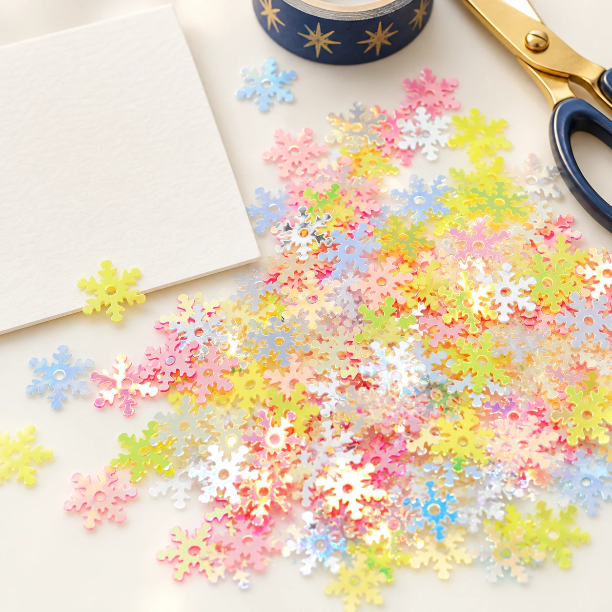 Pastel Snowflake Sequin Mix MA096 in an illustrative craft workspace