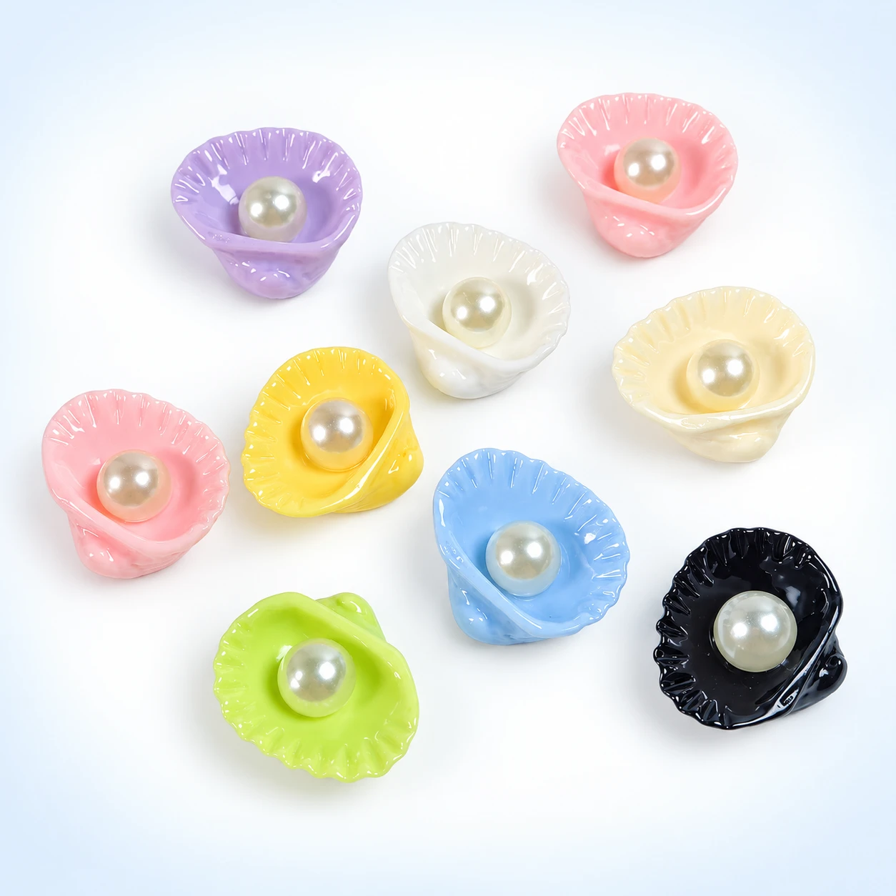 Pearl Shell Resin Charms RW001392 on a clean light studio background