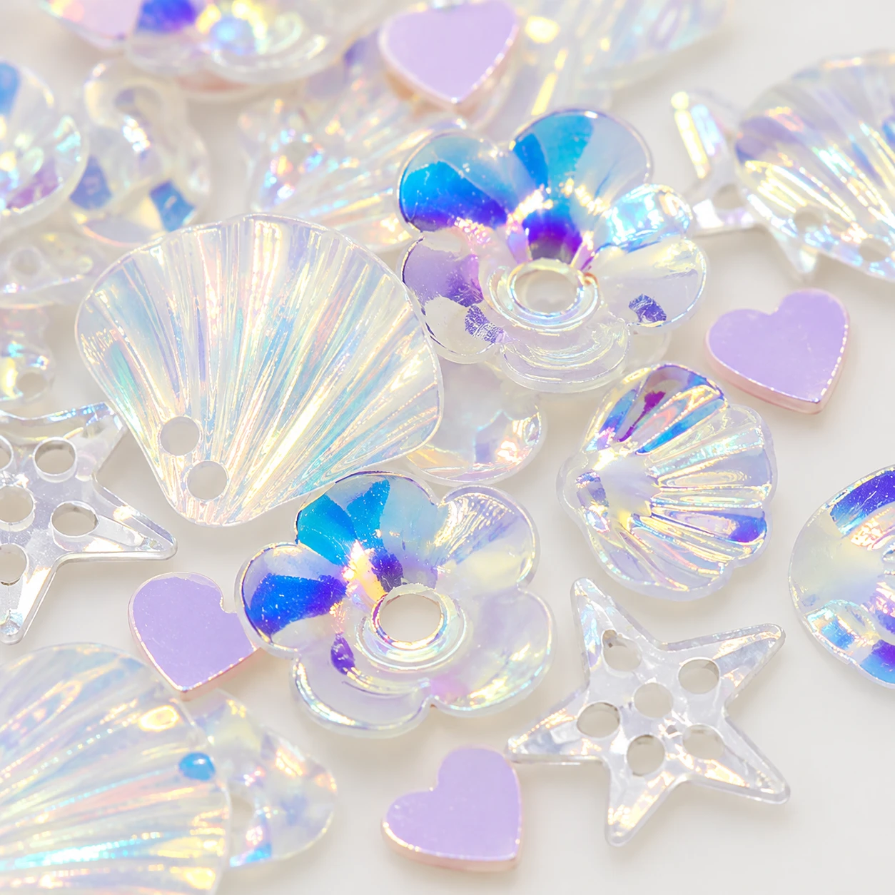 Pearlescent Shell and Disc Sequin Mix MA094 close-up showing the decorative shape and finish