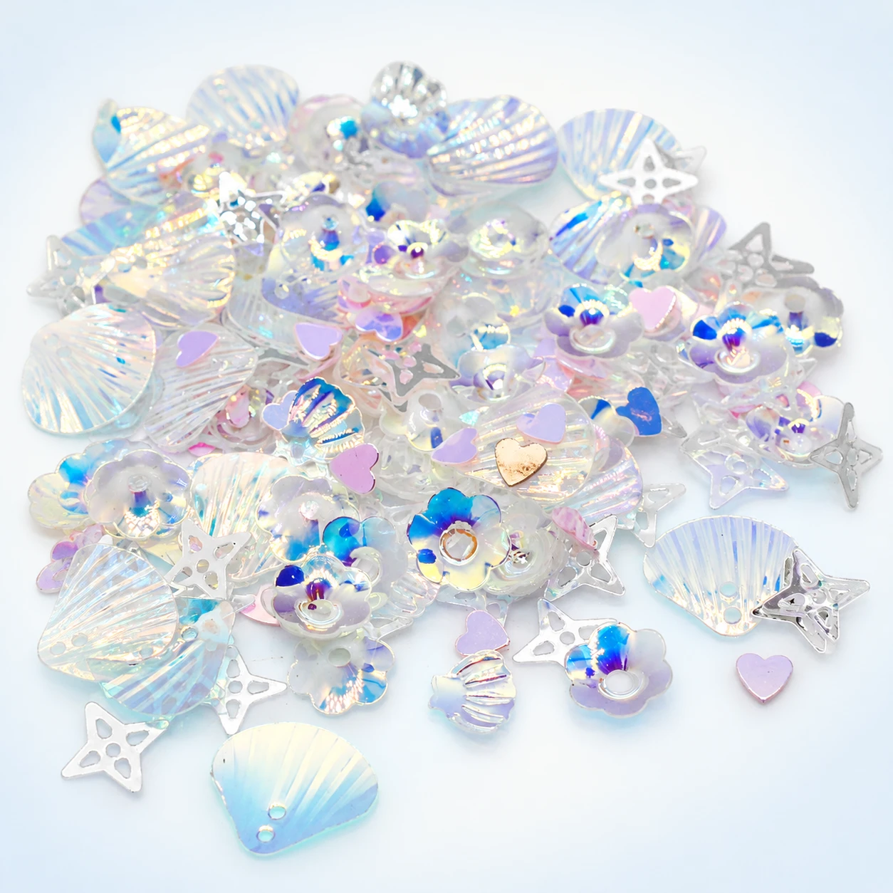 Pearlescent Shell and Disc Sequin Mix MA094 on a clean light studio background