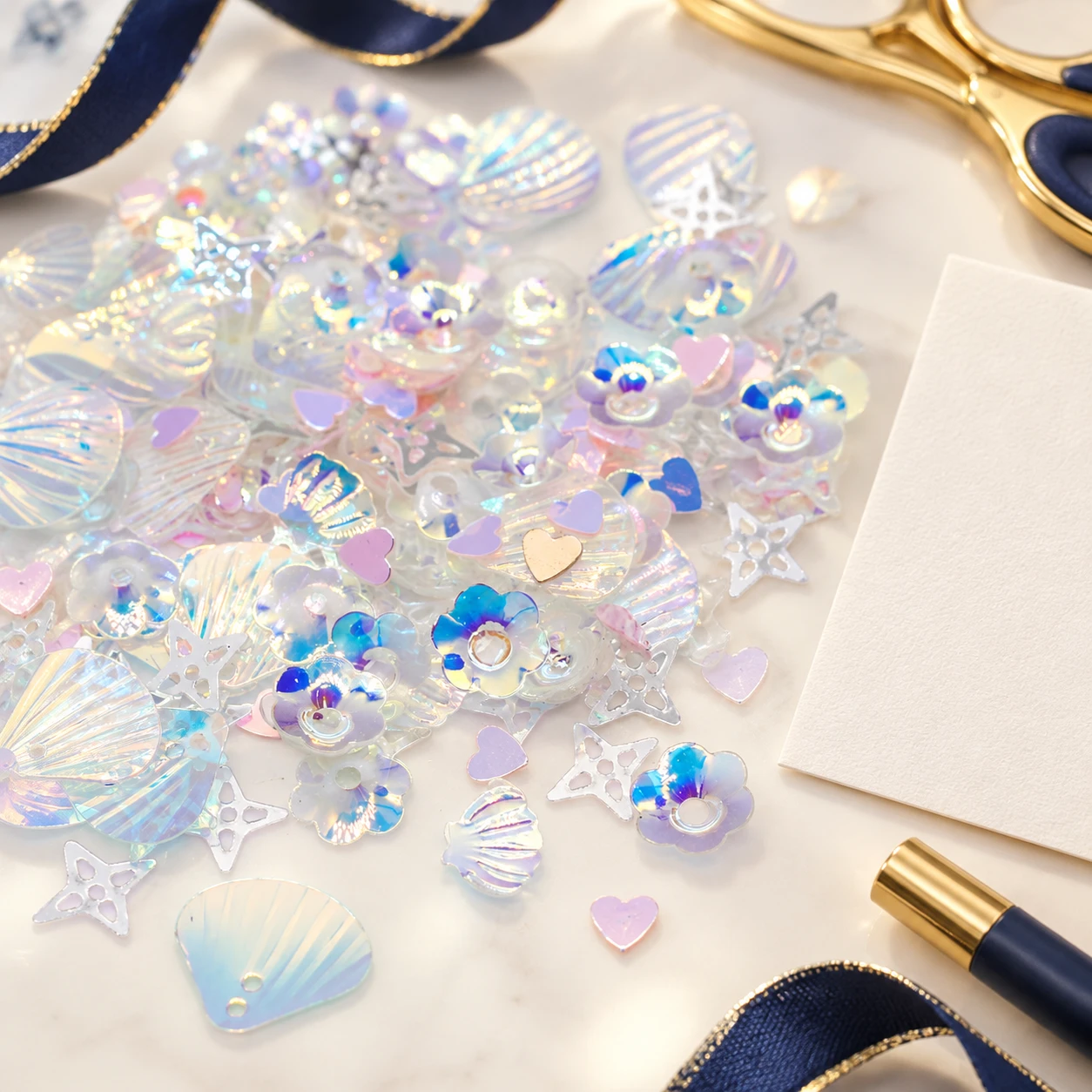 Pearlescent Shell and Disc Sequin Mix MA094 in an illustrative craft workspace