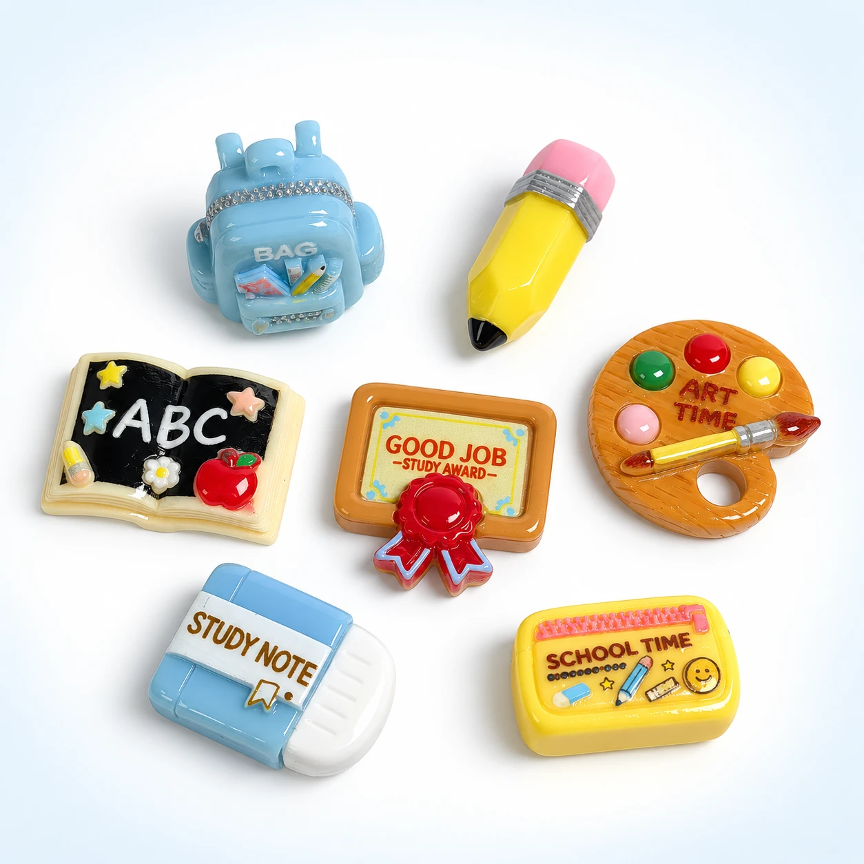 School Stationery Resin Charms RW003559 on a clean light studio background