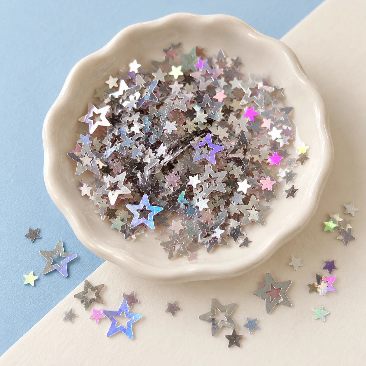 Silver Holographic Hollow Star Sequins MA174 displayed for assortment selection