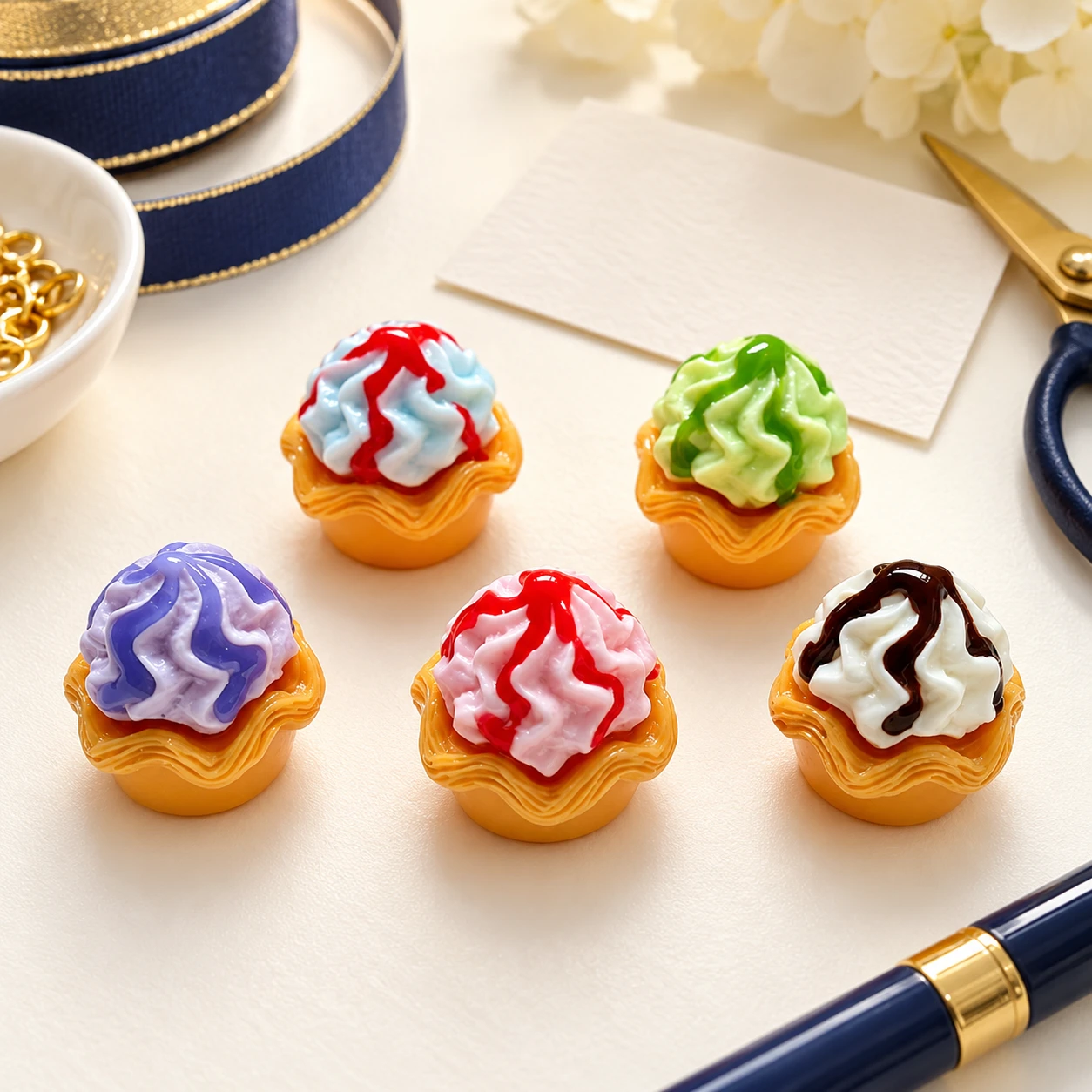 Swirl Cupcake Resin Charms RW0024876 in an illustrative craft workspace