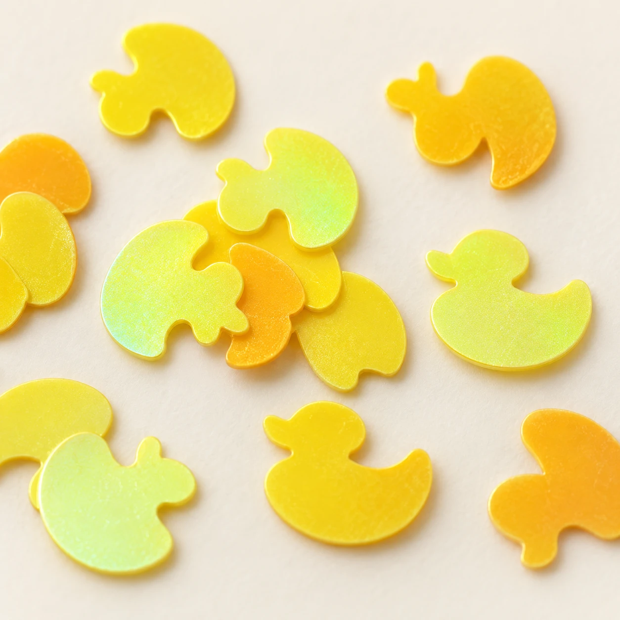 Ultrathin Yellow Duck Sequins MA300 close-up showing the decorative shape and finish