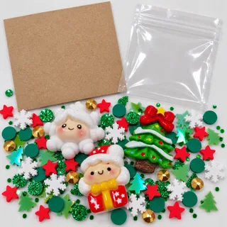 Illustrative blank craft card and empty pouch beside loose Christmas tree, gift and festive filler pieces