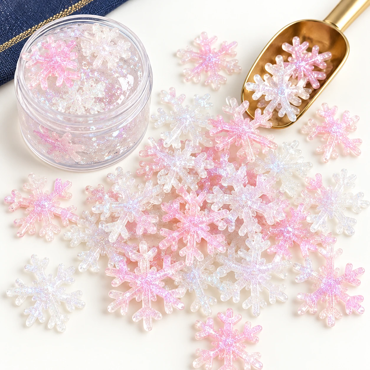 Iridescent Snowflake Resin Charms in a slime-workspace concept, RW24359
