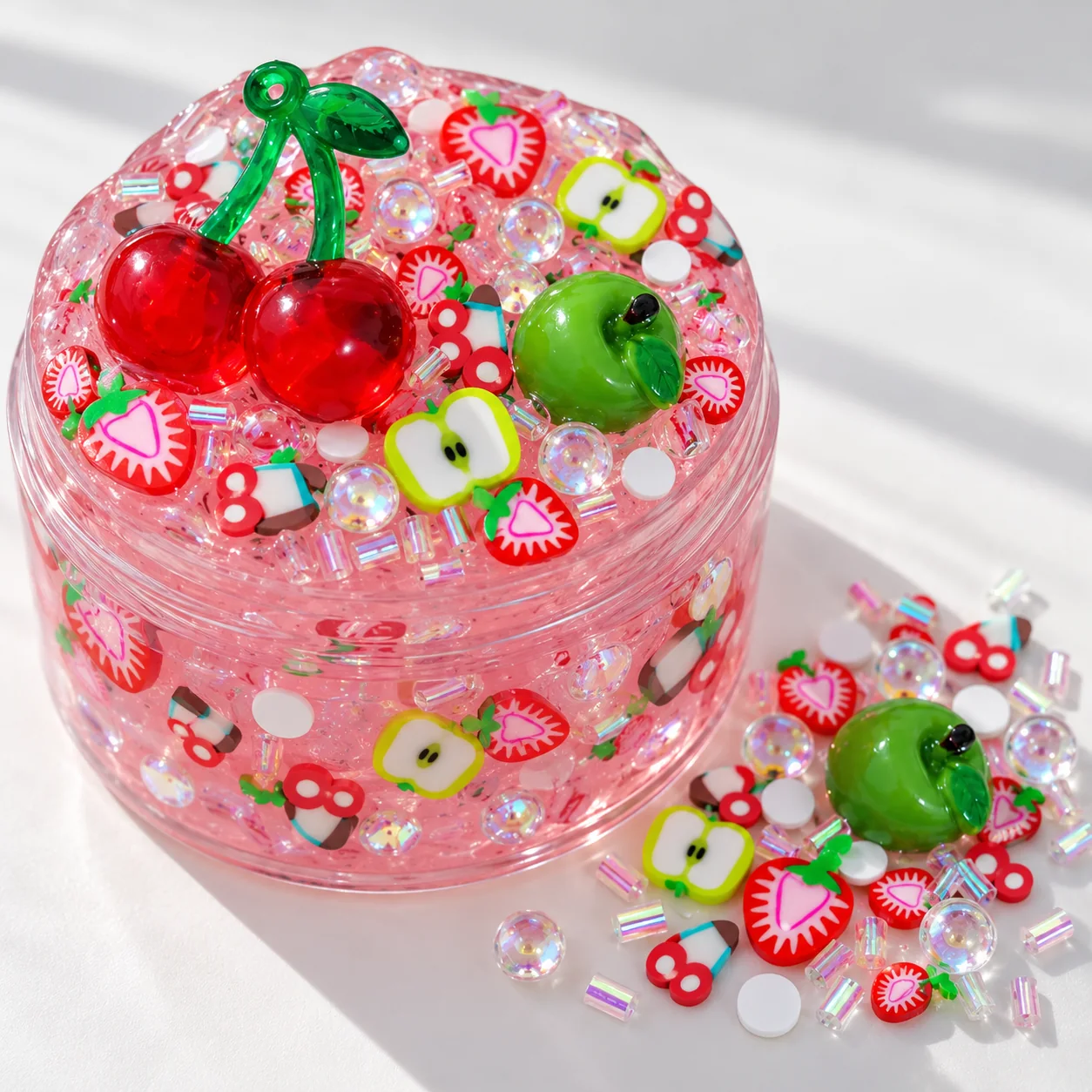 Illustrative pink slime jar decorated with cherry apple strawberry filler pieces