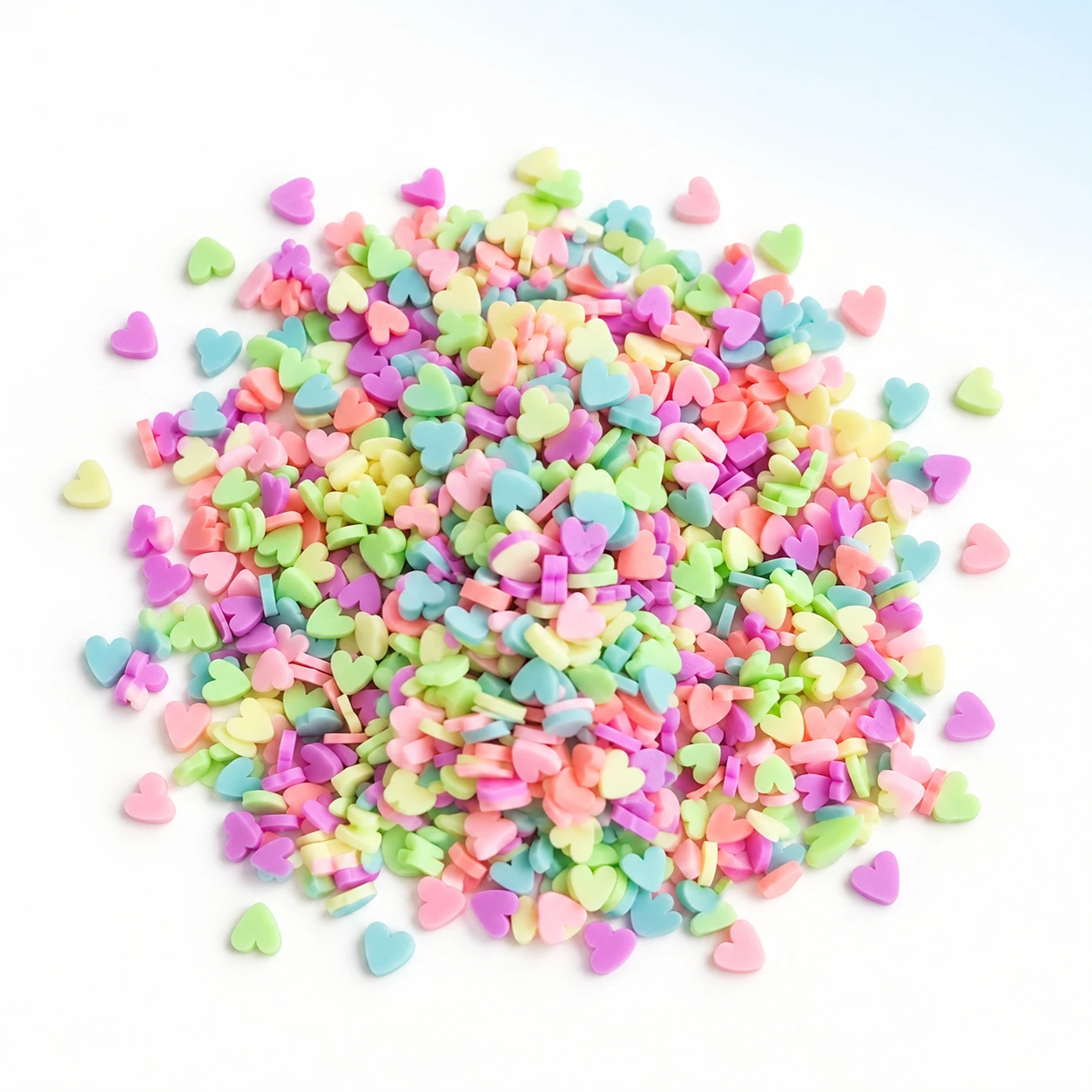 Pastel Heart Polymer Clay Slices on a bright white studio background, YX3906